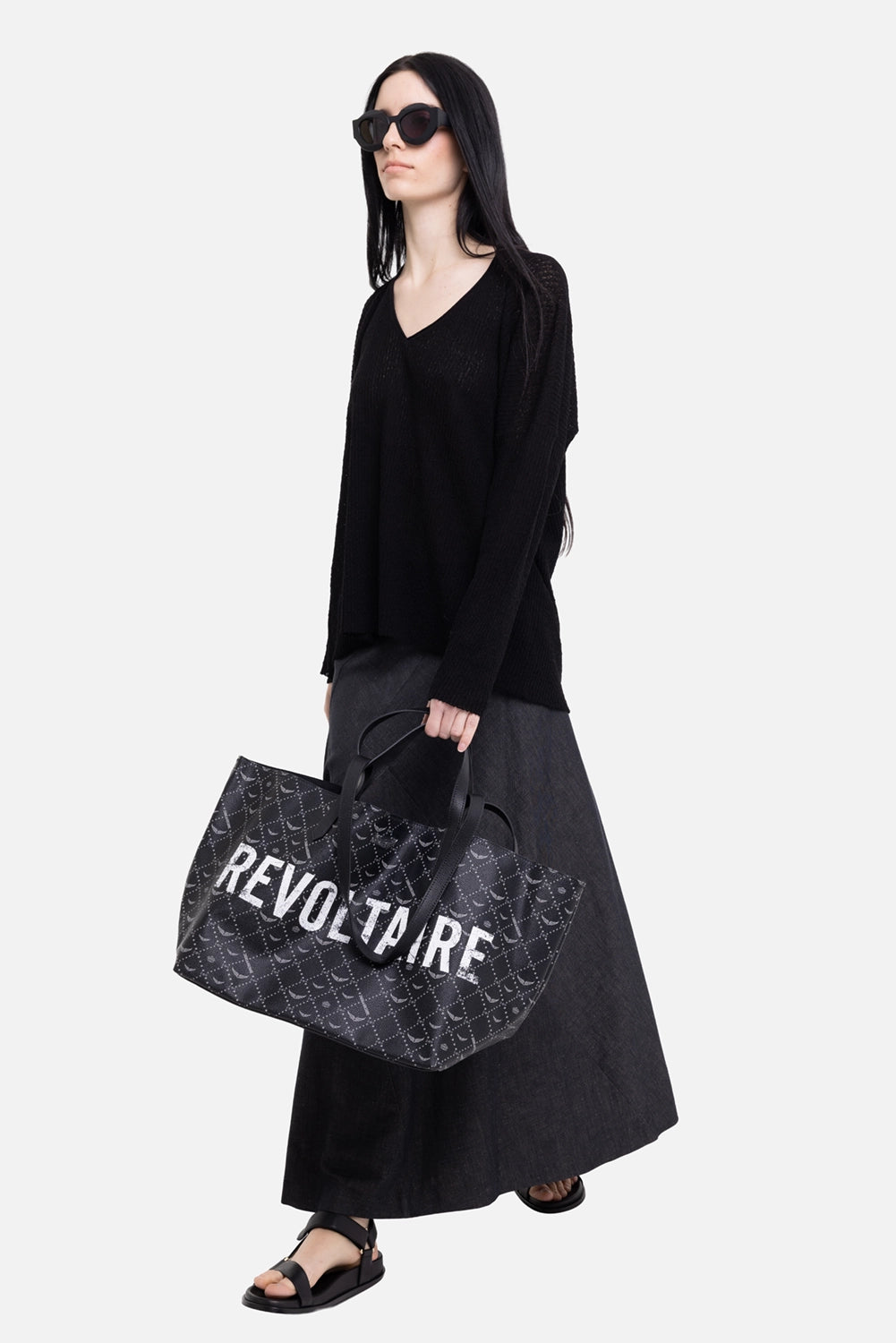 Gentry Portofino women's V-neck knit top in nero, on-model full length, relaxed drape and long sleeves