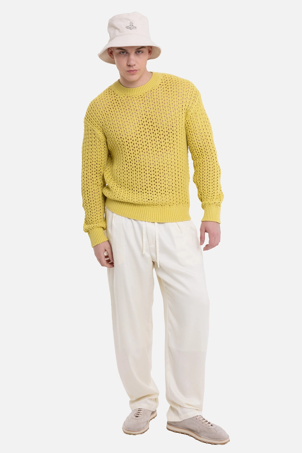 Helmut Lang men's crewneck sweater in chartreuse, on-model full-length view with ribbed cuffs