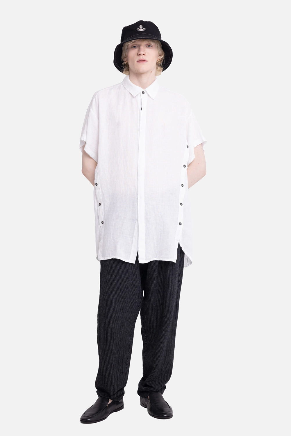 La Haine Inside Us men's overshirt in white, on-model full-length, black side buttons and relaxed hem