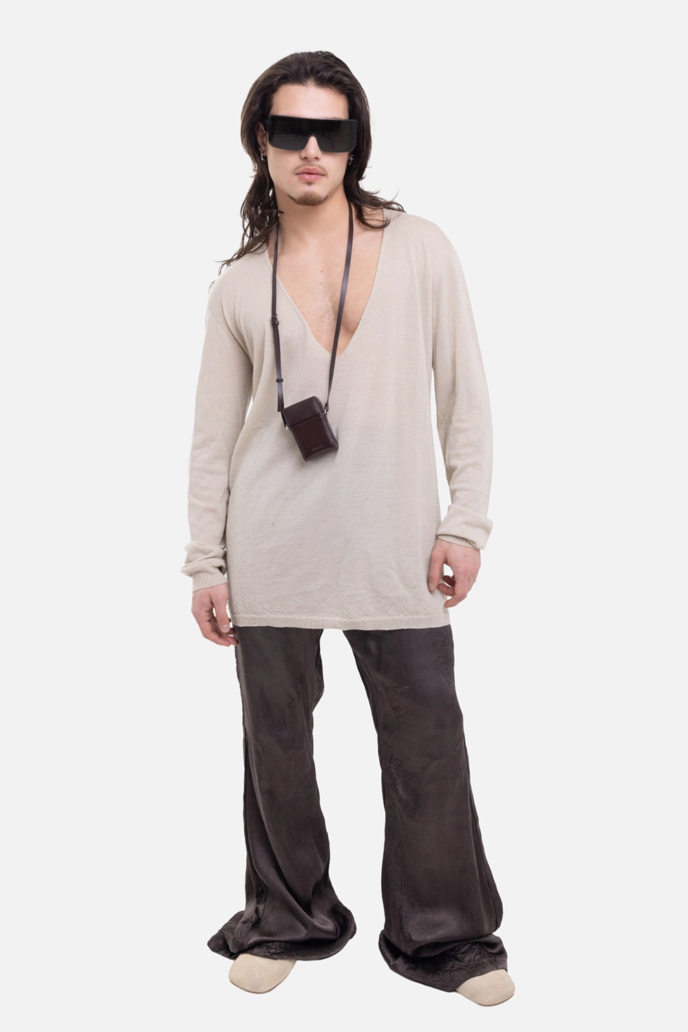 Rick Owens men's sweater in sand, on-model full-length view with deep V-neck and ribbed hem