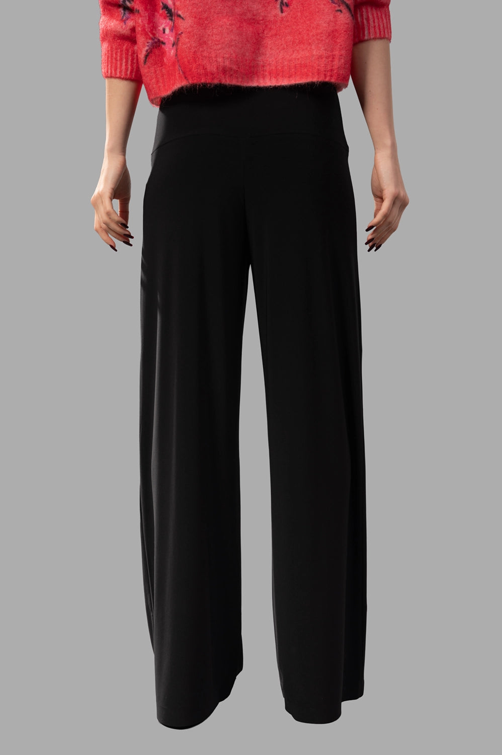 Norma Kamali straight leg pant in black, back view, smooth stretch jersey and clean hem