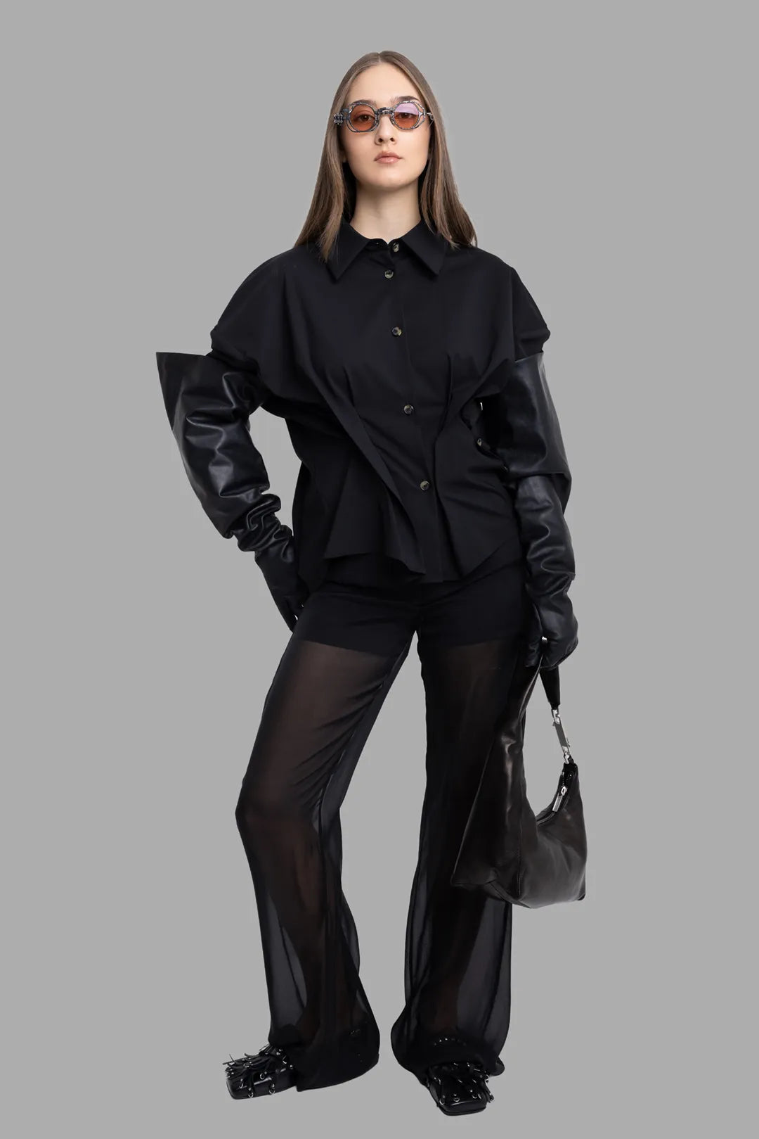MSGM women's black sheer overlay pants, on-model full length front view with inner shorts and fluid voile legs