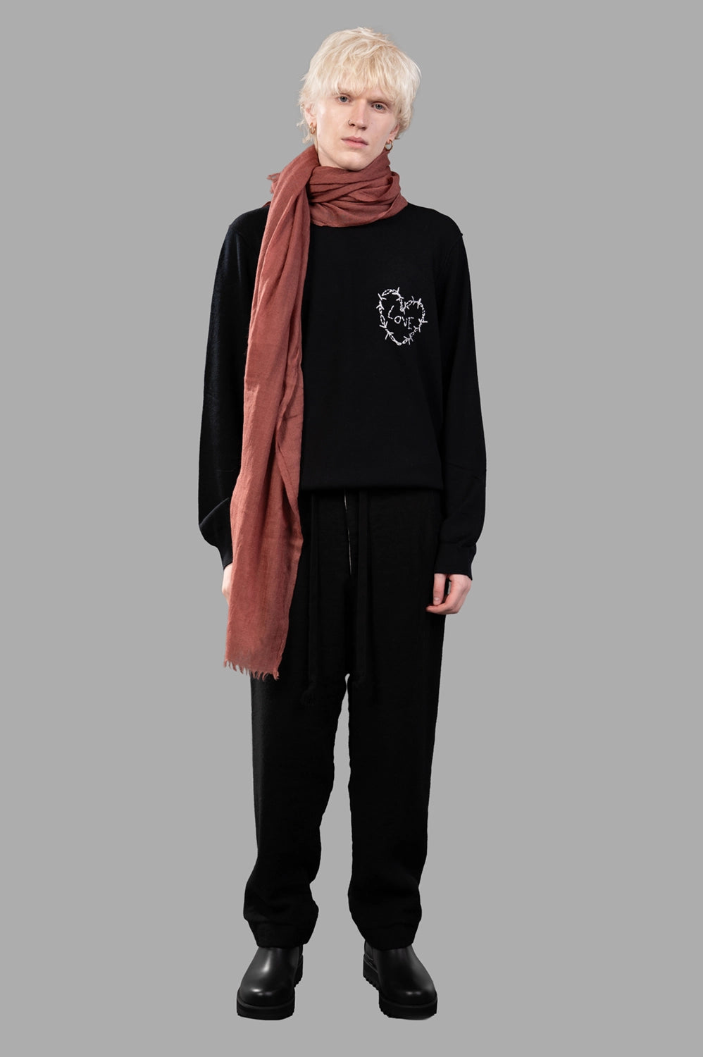 UMA WANG pants in black, on-model full length, drawstring waist and cuffed hems