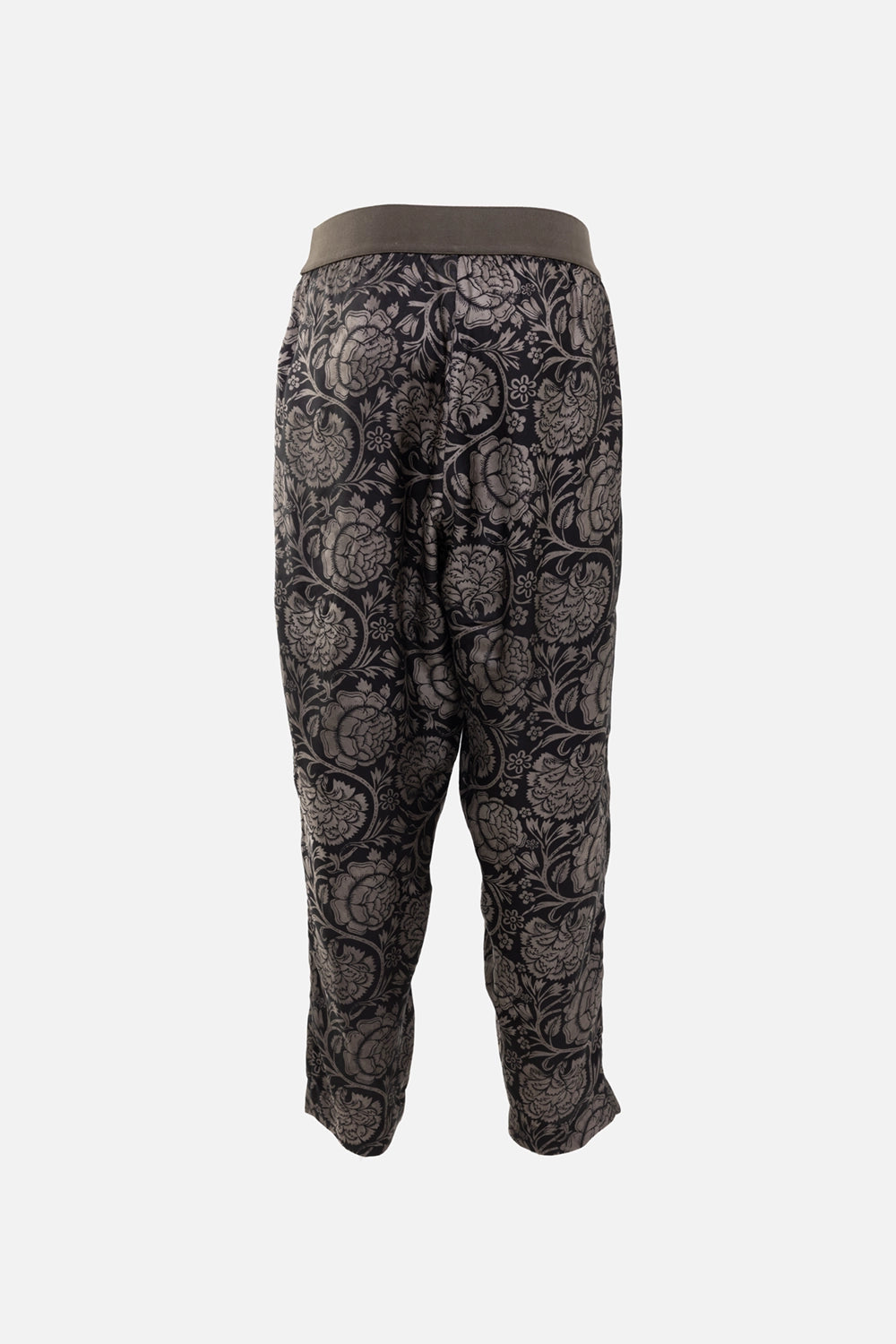 Uma Wang women’s pants in black and tan, back view, tapered leg with allover floral motif