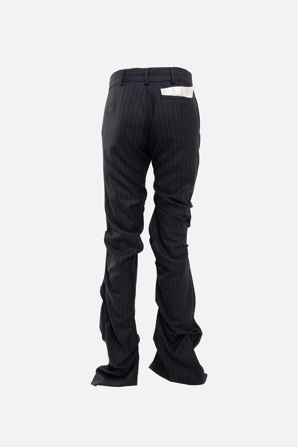 Natasha Zinko women's pinstripe pants in black/white, back view, rear welt pocket with striped insert.