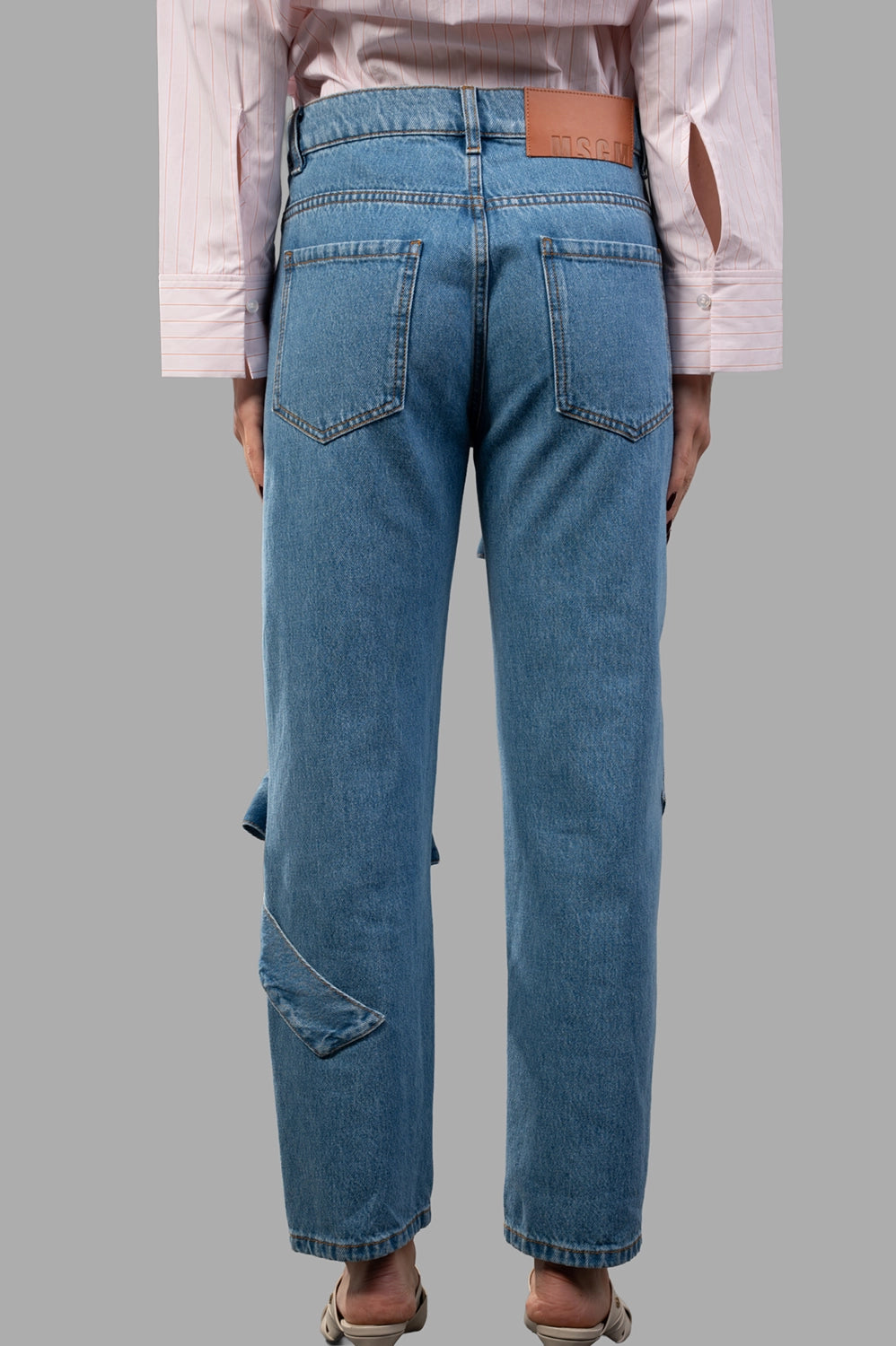 MSGM pants in blue washed denim, back view, rear pockets and yoke detail
