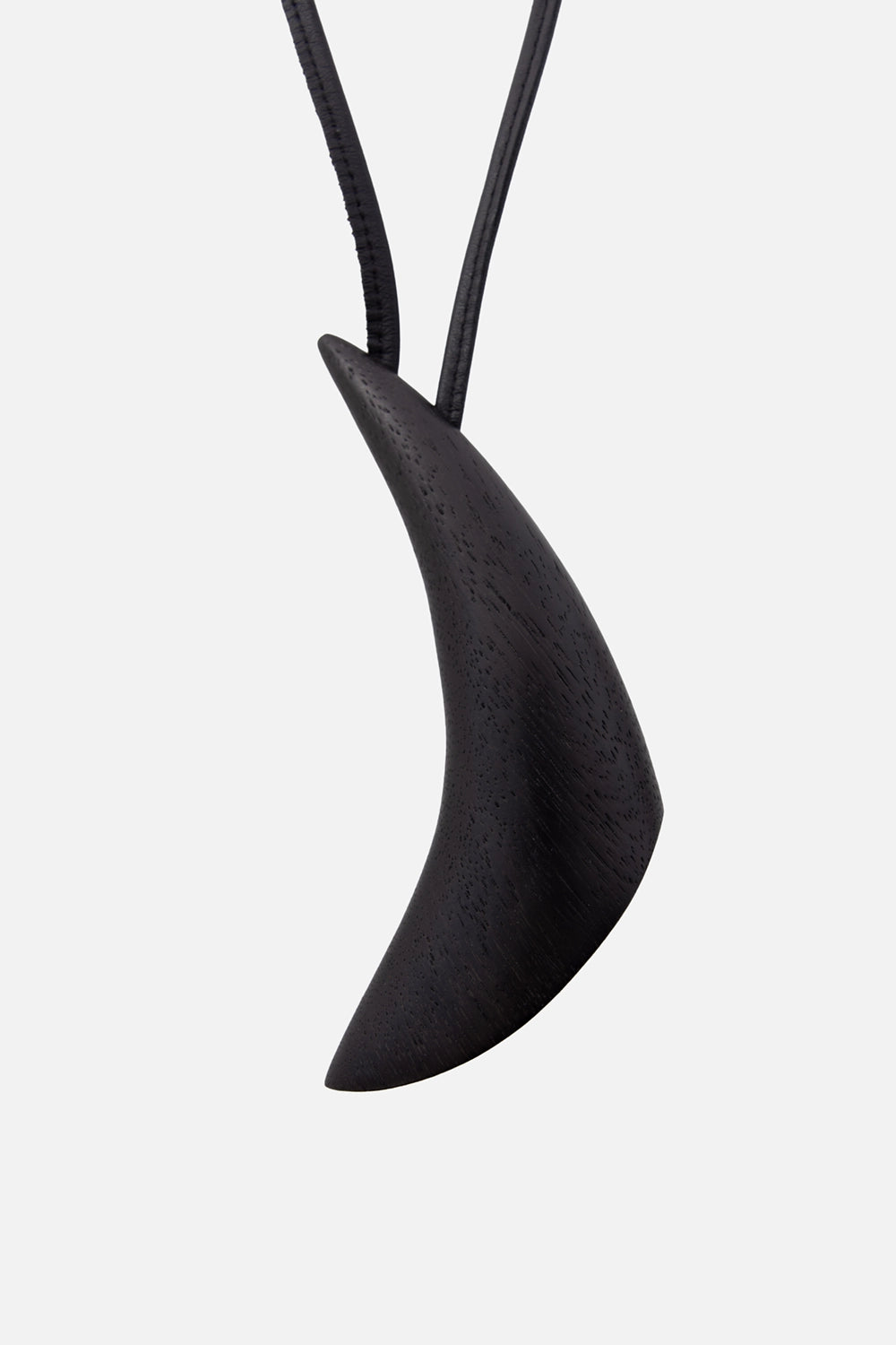 Monies women's pendant necklace in black, pendant detail, sweeping crescent shape with visible wood grain