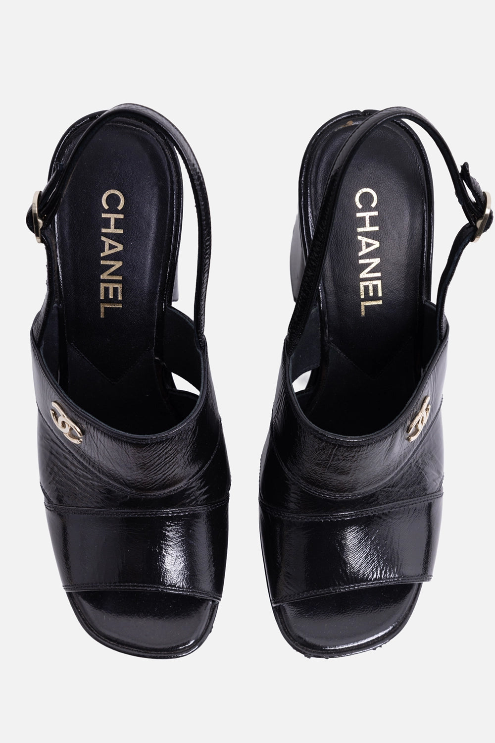 Pre-owned Chanel women’s platform sandals in black, top view, CHANEL footbed logo with slingback buckle strap