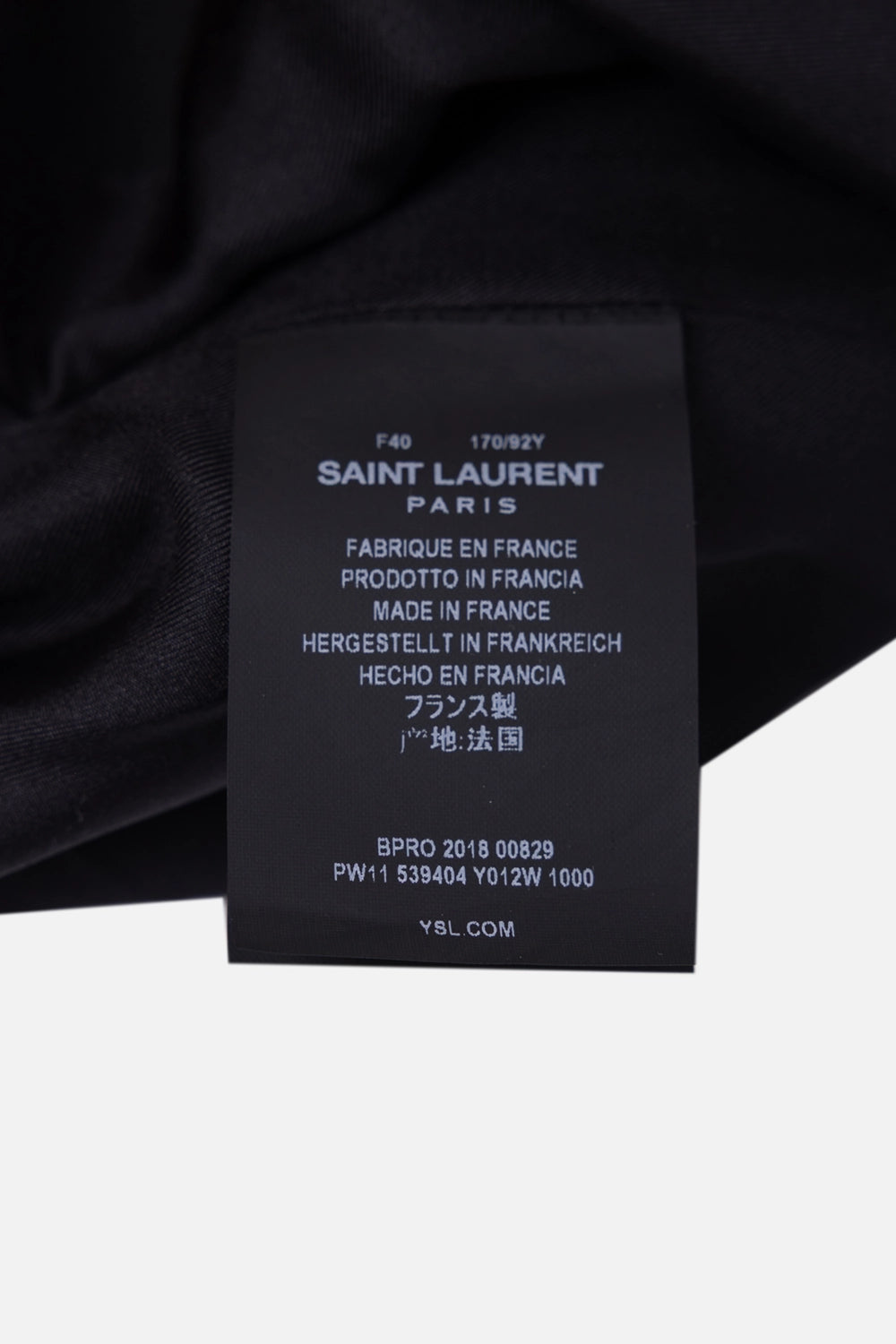 Pre-owned Saint Laurent playsuit in black, label close-up, Saint Laurent Paris tag made in France