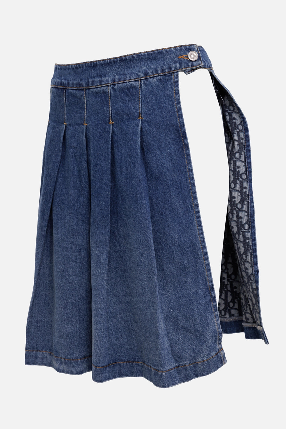 Christian Dior women's wrap skirt in blue, front view with pleated panels and side snap opening