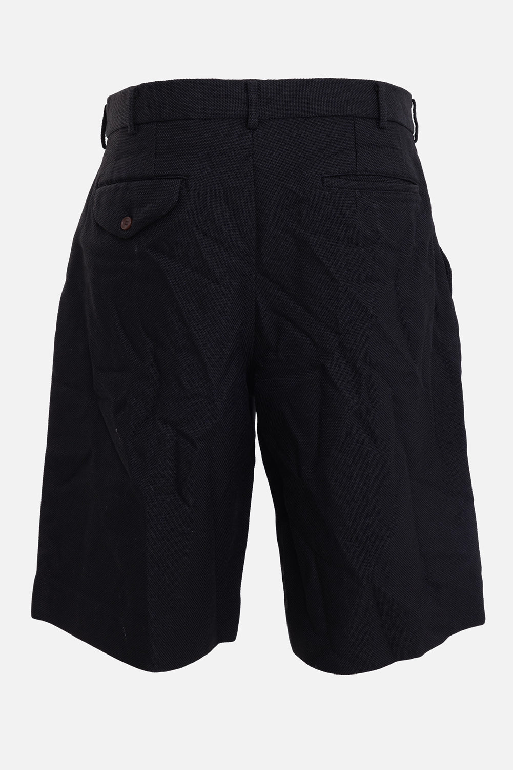 Comme des Garçons Homme Deux men's black shorts, back view, flap pocket, welt pocket and textured weave
