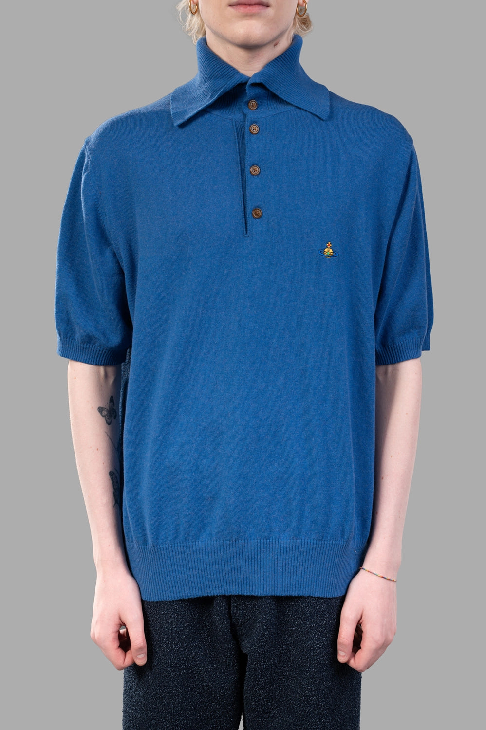 Vivienne Westwood polo shirt in blue, front view, five-button placket, Orb chest logo, ribbed collar