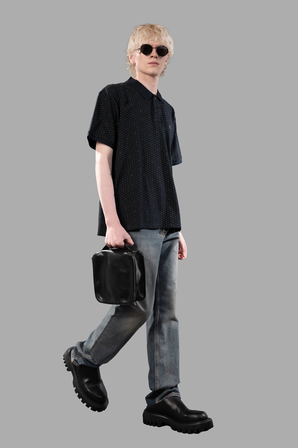 Vivienne Westwood polo shirt in Dots & Orbs, on-model full length, rib collar and all-over micro print