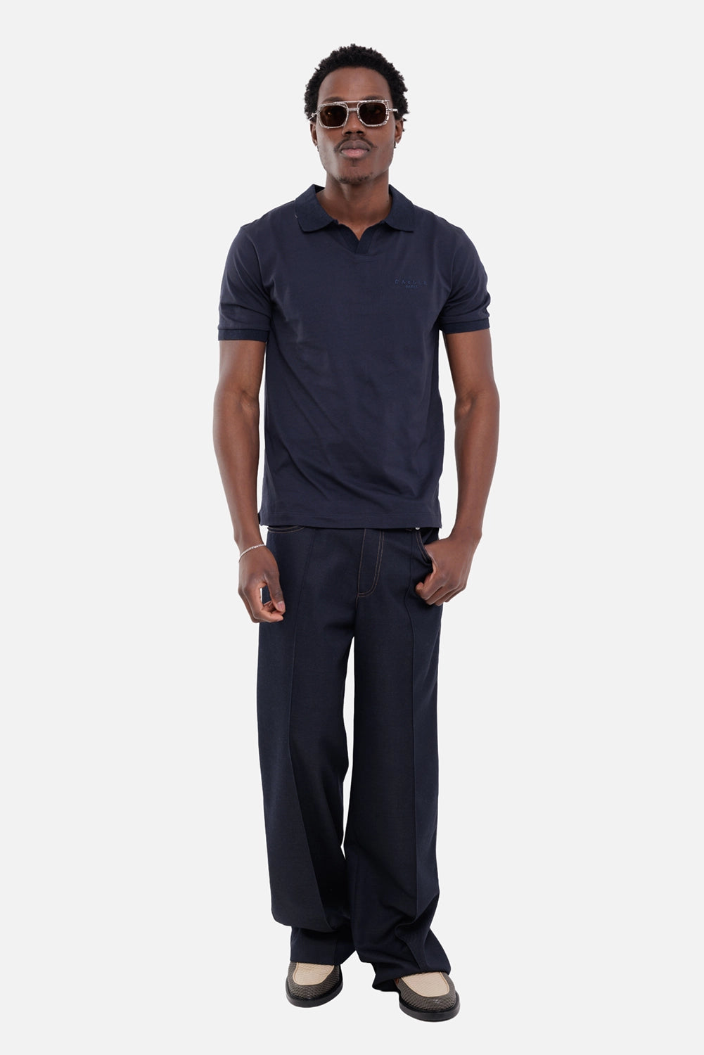 Gaëlle Paris men's polo shirt in navy blue, on-model full-length view, short sleeves and open collar
