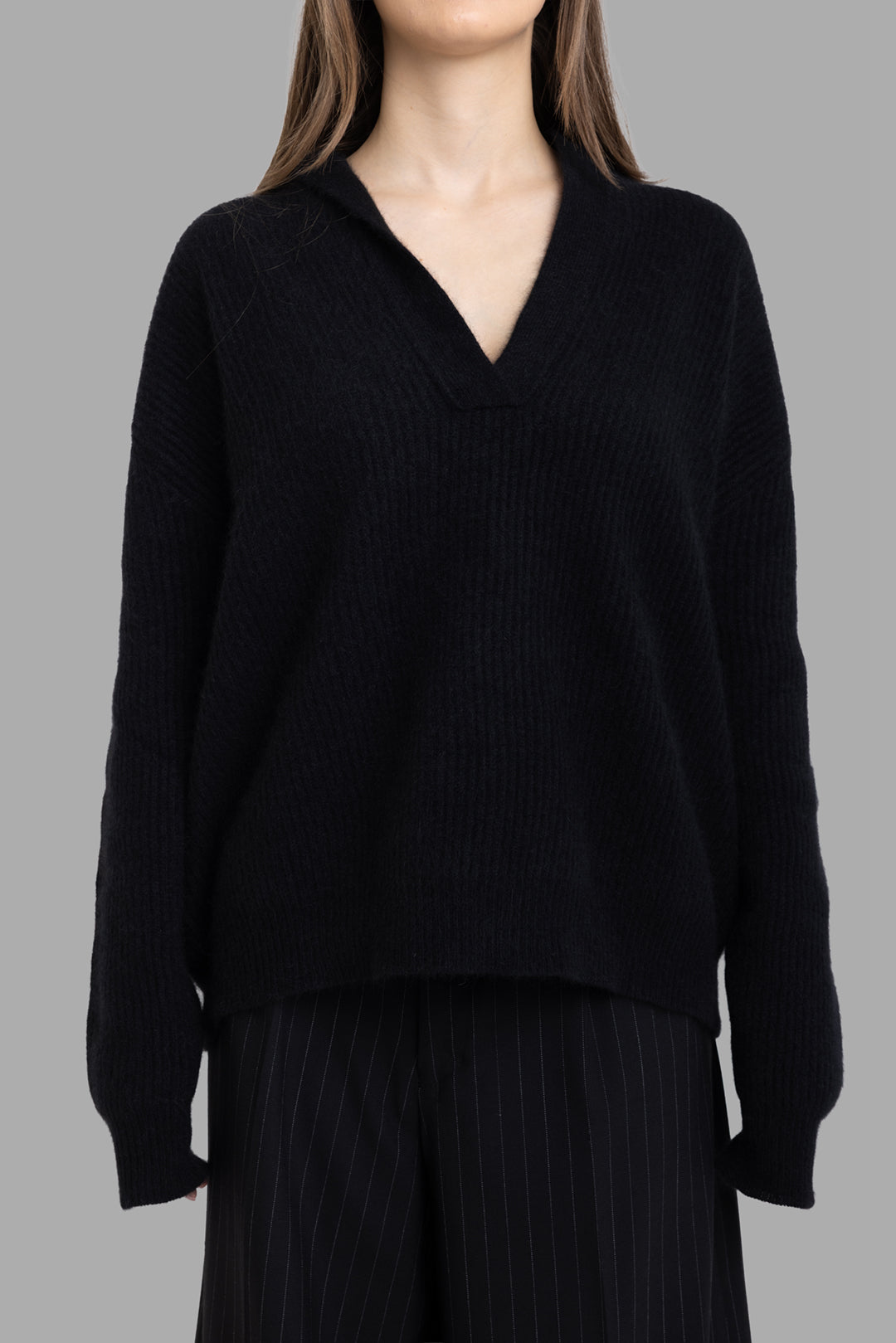 Uma Wang women's black raccoon polo sweater, front half-length view, ribbed knit with dropped shoulders