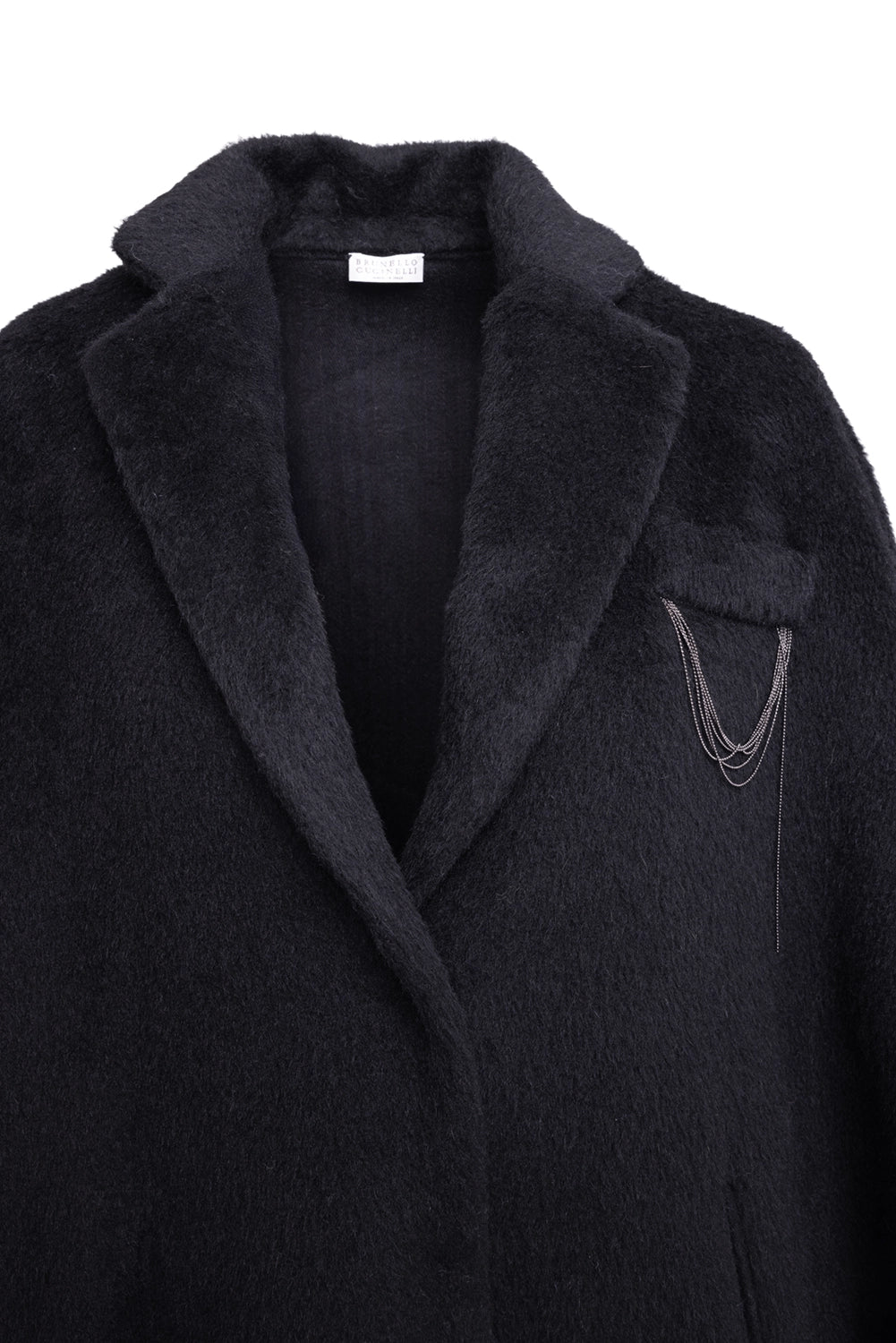 Pre-owned Brunello Cucinelli women's poncho in black, detail view, monili chain embellishment at chest