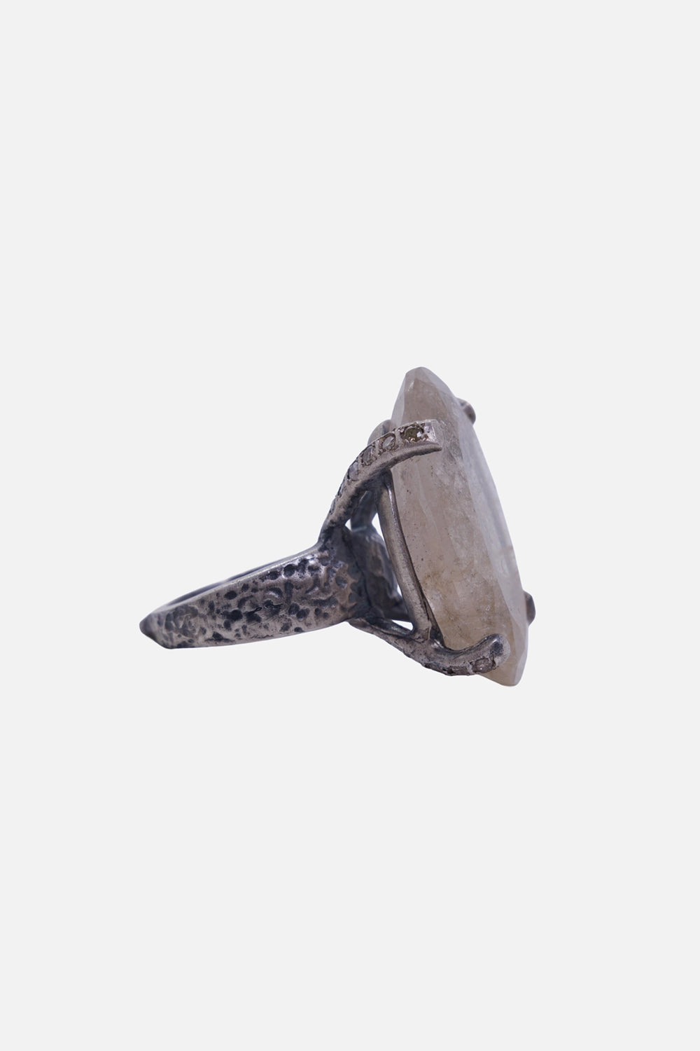 Kundo unisex quartz statement ring in silver, side view with a raised open gallery and hammered tapered band
