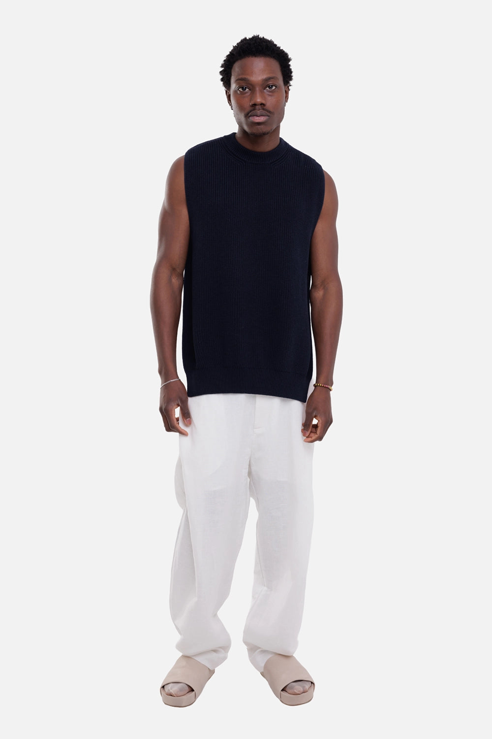 Giovanni Cavagna men's trousers in white, on-model full-length view, wide straight leg with soft break