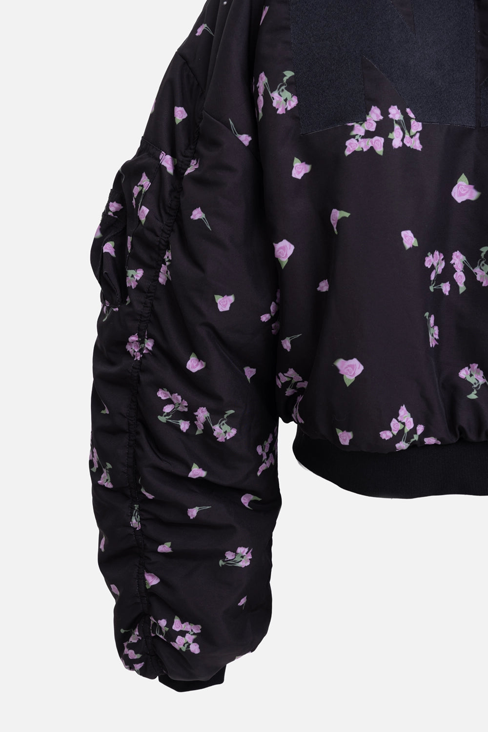 Natasha Zinko reversible bomber jacket in black/grey, sleeve detail, oversized padded arm with floral print