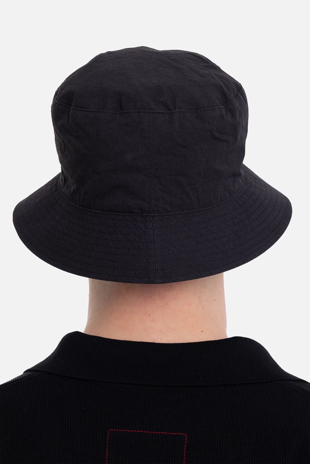 KIJIMA TAKAYUKI unisex bucket hat in black/gray, back view in black cotton twill with paneled crown