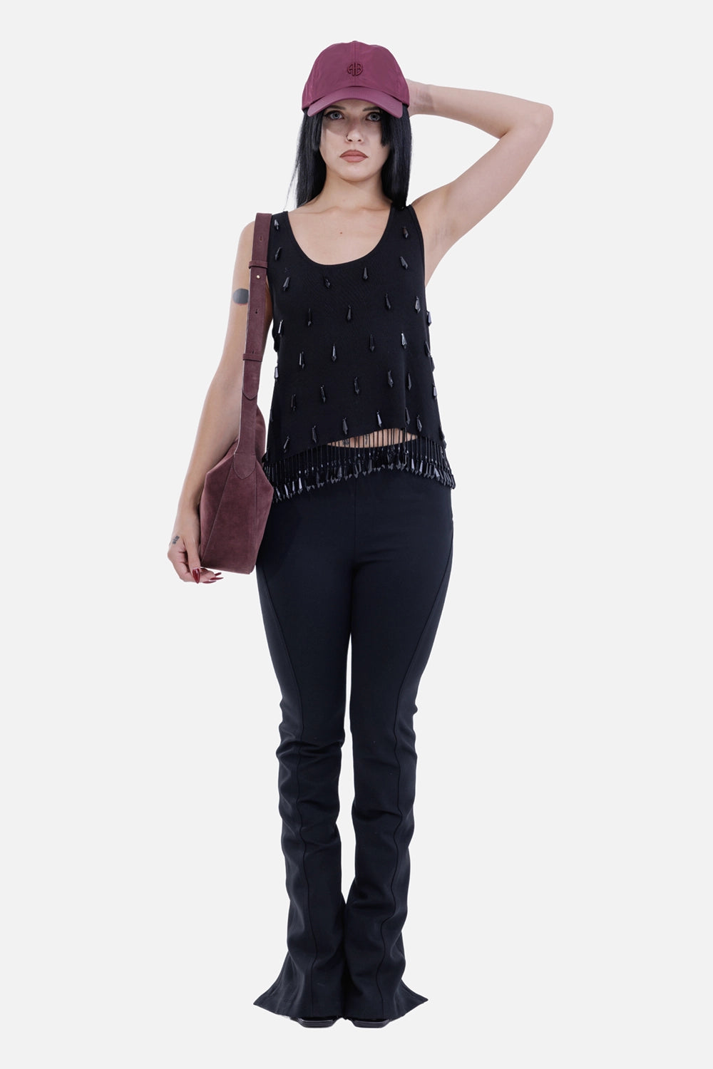 Helmut Lang women's Rider leggings in black, full-length model view with slim fit and flared zip hems