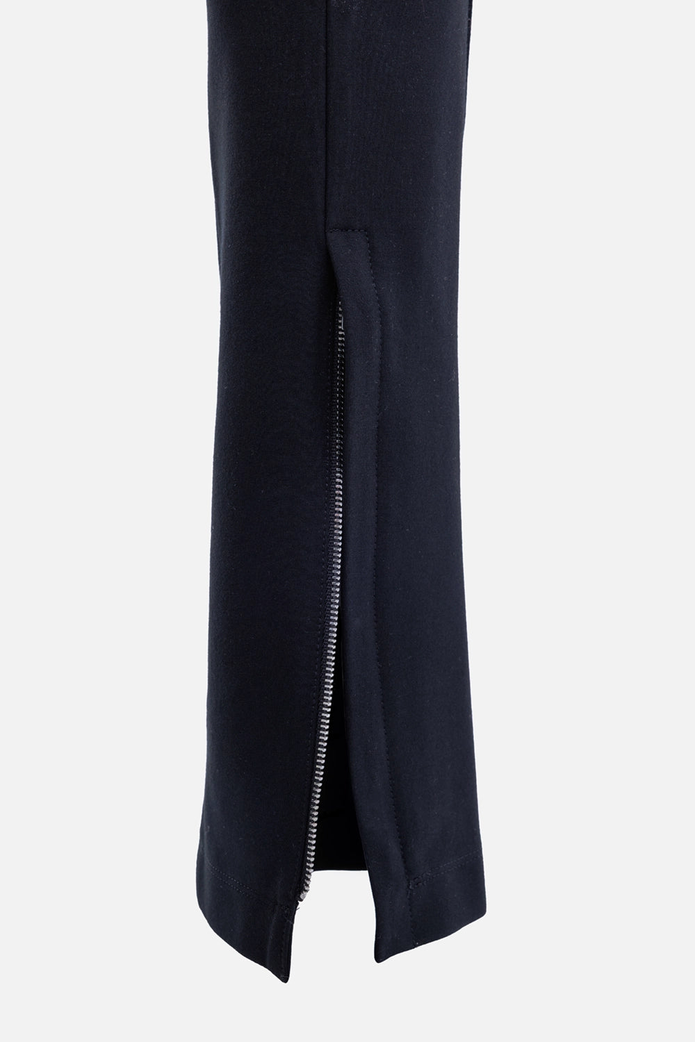 Helmut Lang women's Rider leggings in black, ankle detail with exposed metal zip and split hem