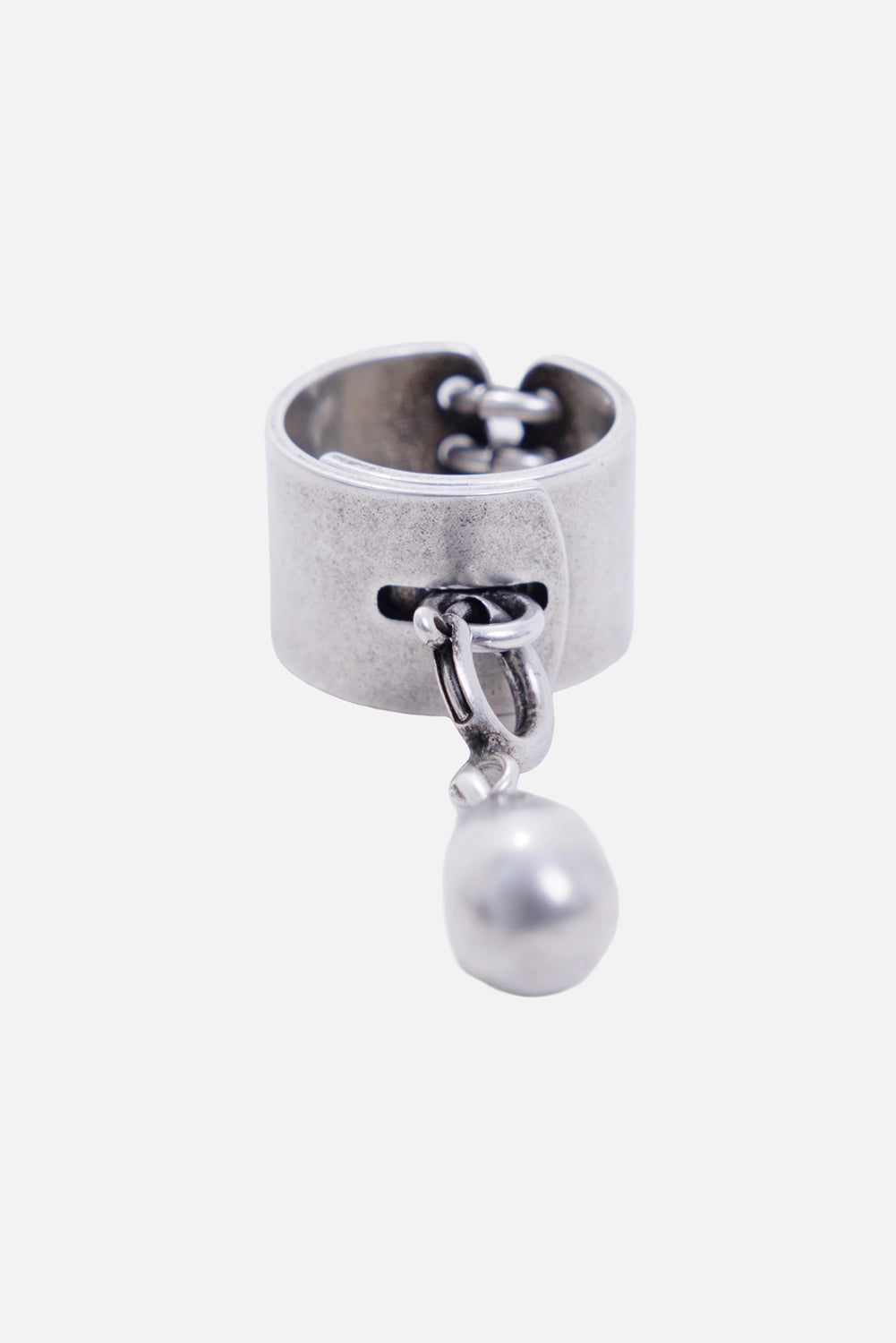 Ann Demeulemeester women's Aurelie ring in antique silver, three-quarter view with dangling pearl pendant

