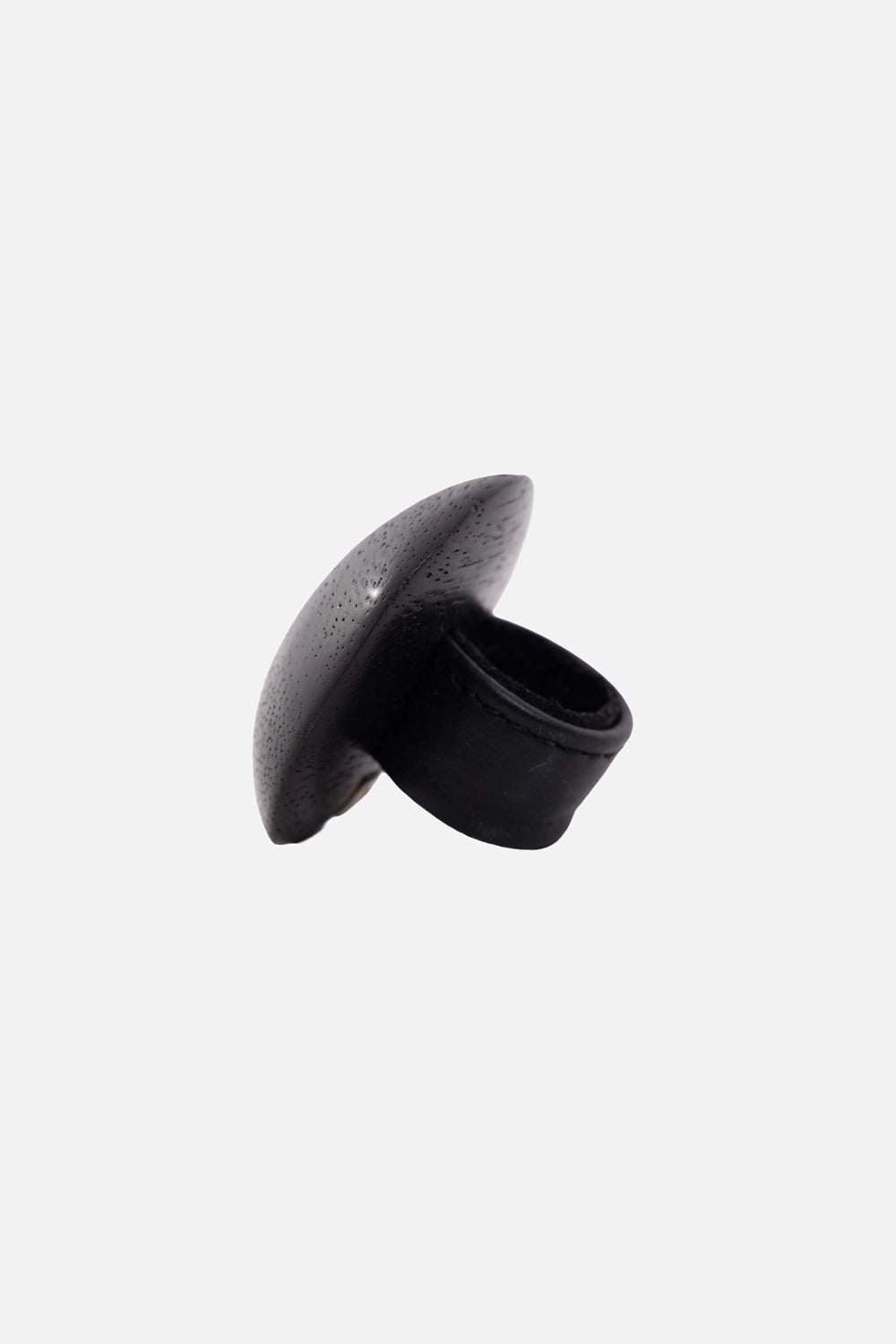 Monies women's ring in black/silver, side view, wide black leather band under domed wood disc