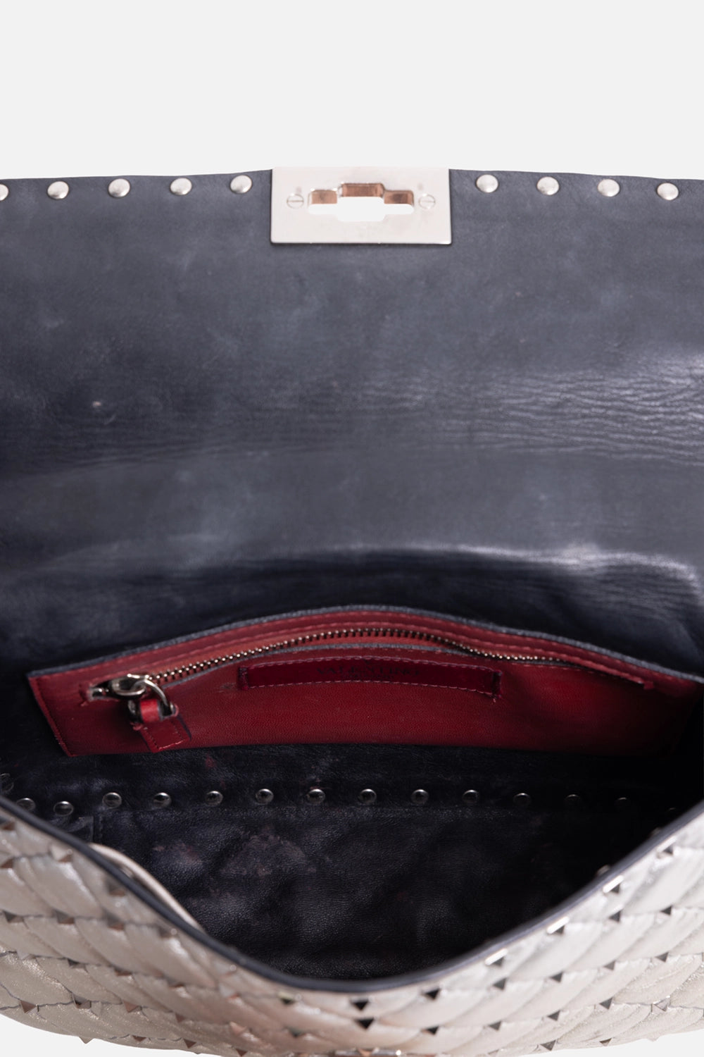 Pre-owned Valentino Garavani small shoulder bag in silver, interior view, black lining with red zip pocket