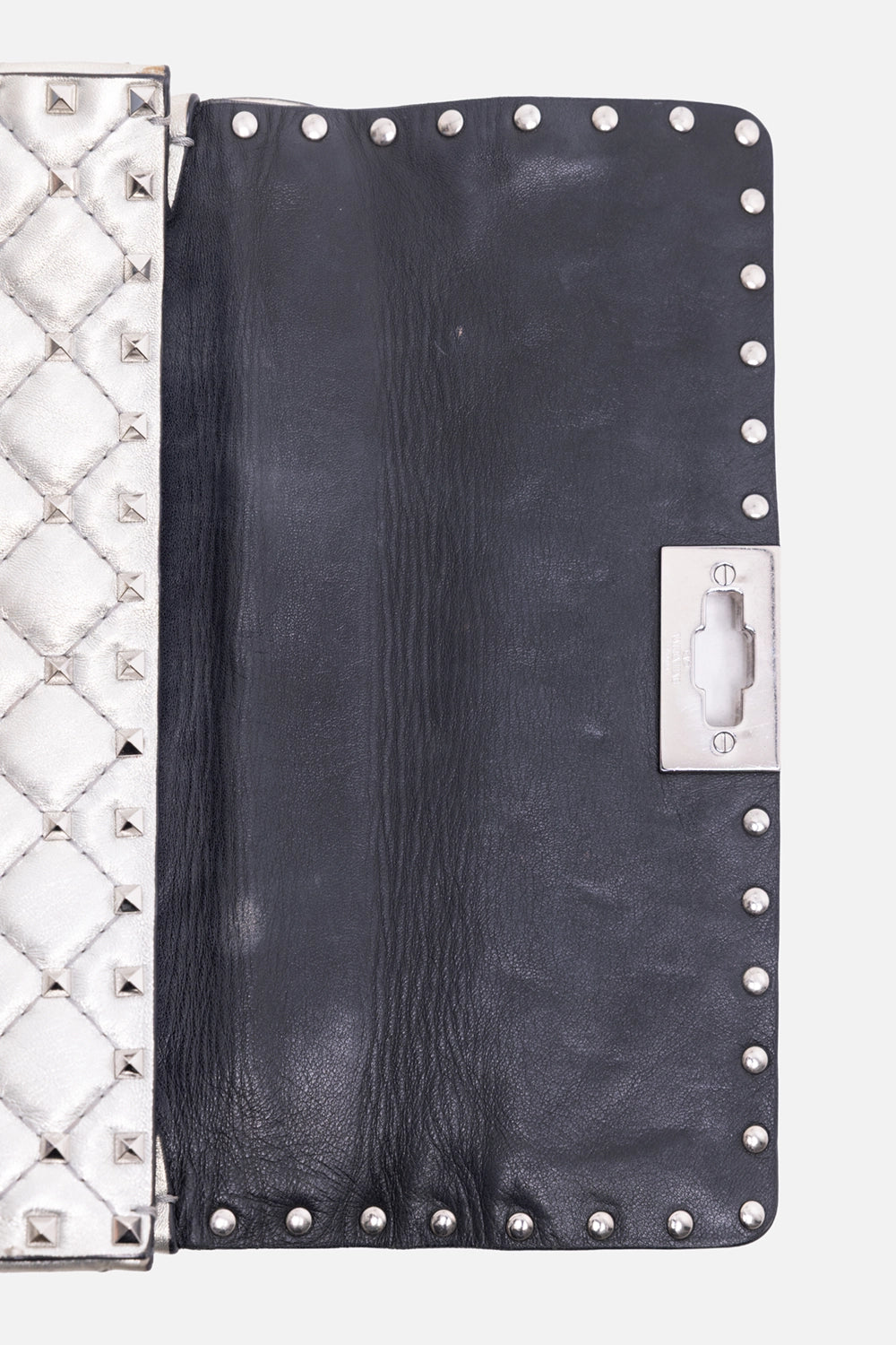 Pre-owned Valentino Garavani small shoulder bag in silver, flap interior view, studded trim and metal closure plate