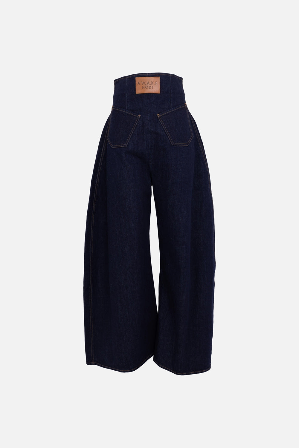 A.W.A.K.E. MODE Roy back-to-front jeans in indigo rinse wash, back view with logo patch and rear pockets