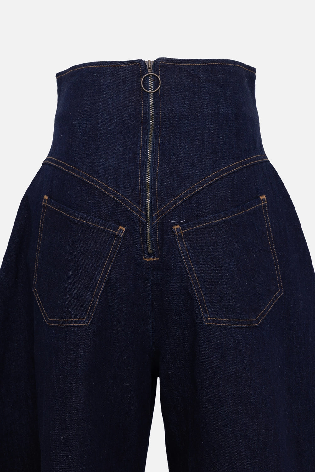 A.W.A.K.E. MODE Roy back-to-front jeans in indigo rinse wash, waist zip with ring pull and pocket detail