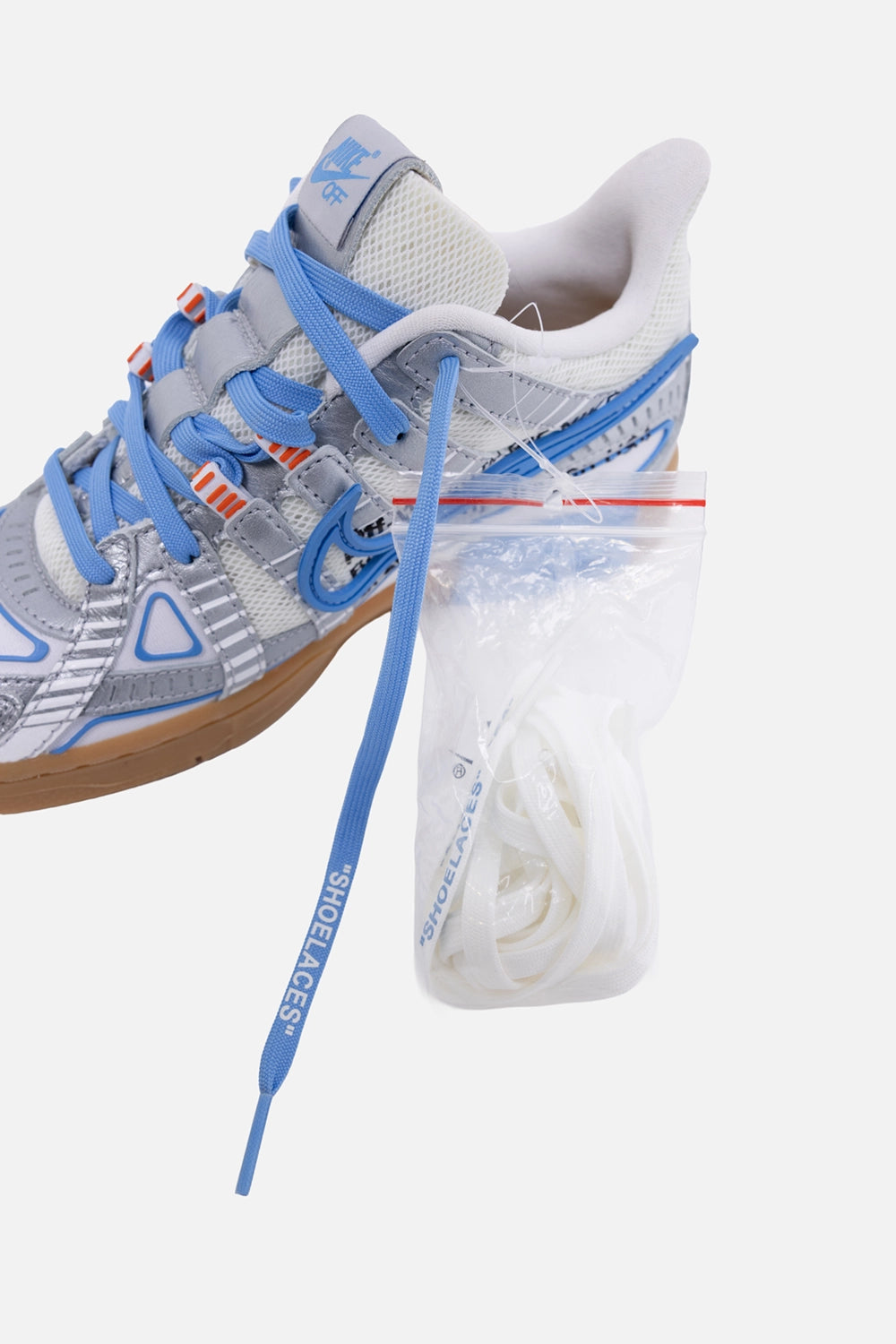 Pre-owned Nike x Off-White unisex Rubber Dunk sneakers in white/blue, detail view, “SHOELACES” lace and spare laces bag