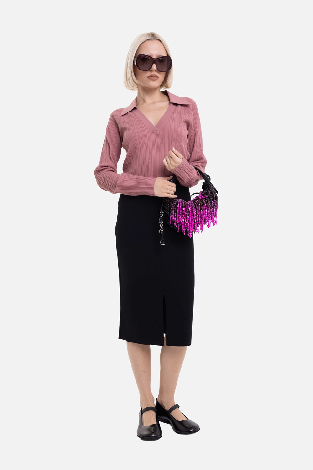 JOSEPH women's Safir knit skirt in Black, on-model full-length view, slim midi fit and front slit