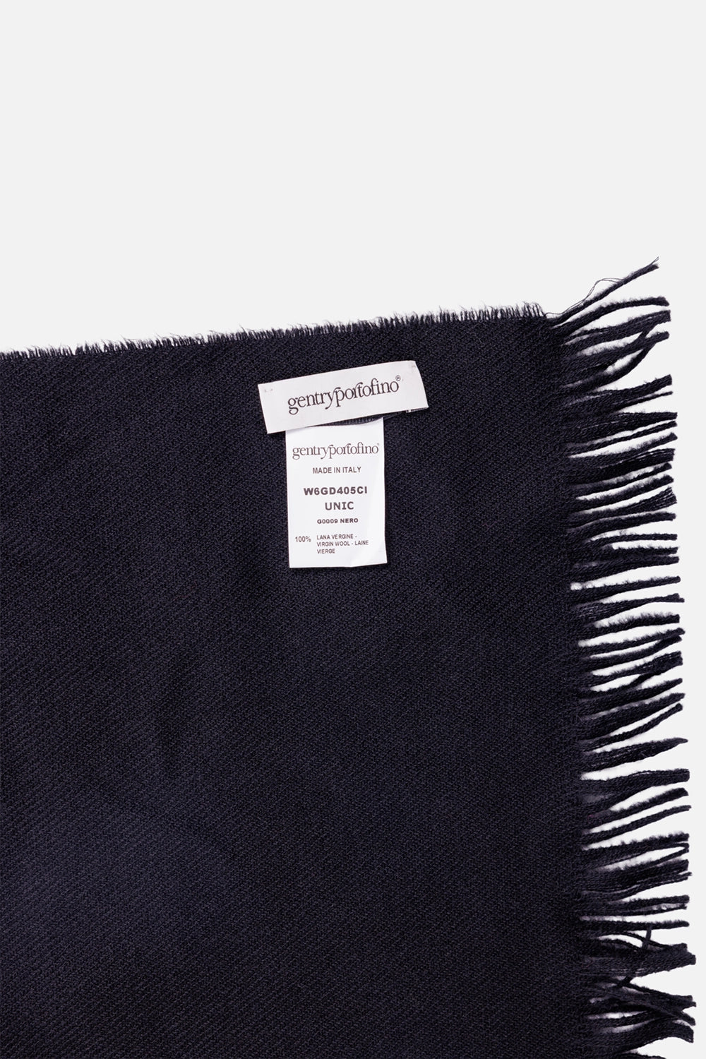 Gentry Portofino scarf in black, label detail with fringe edge and fine virgin wool weave