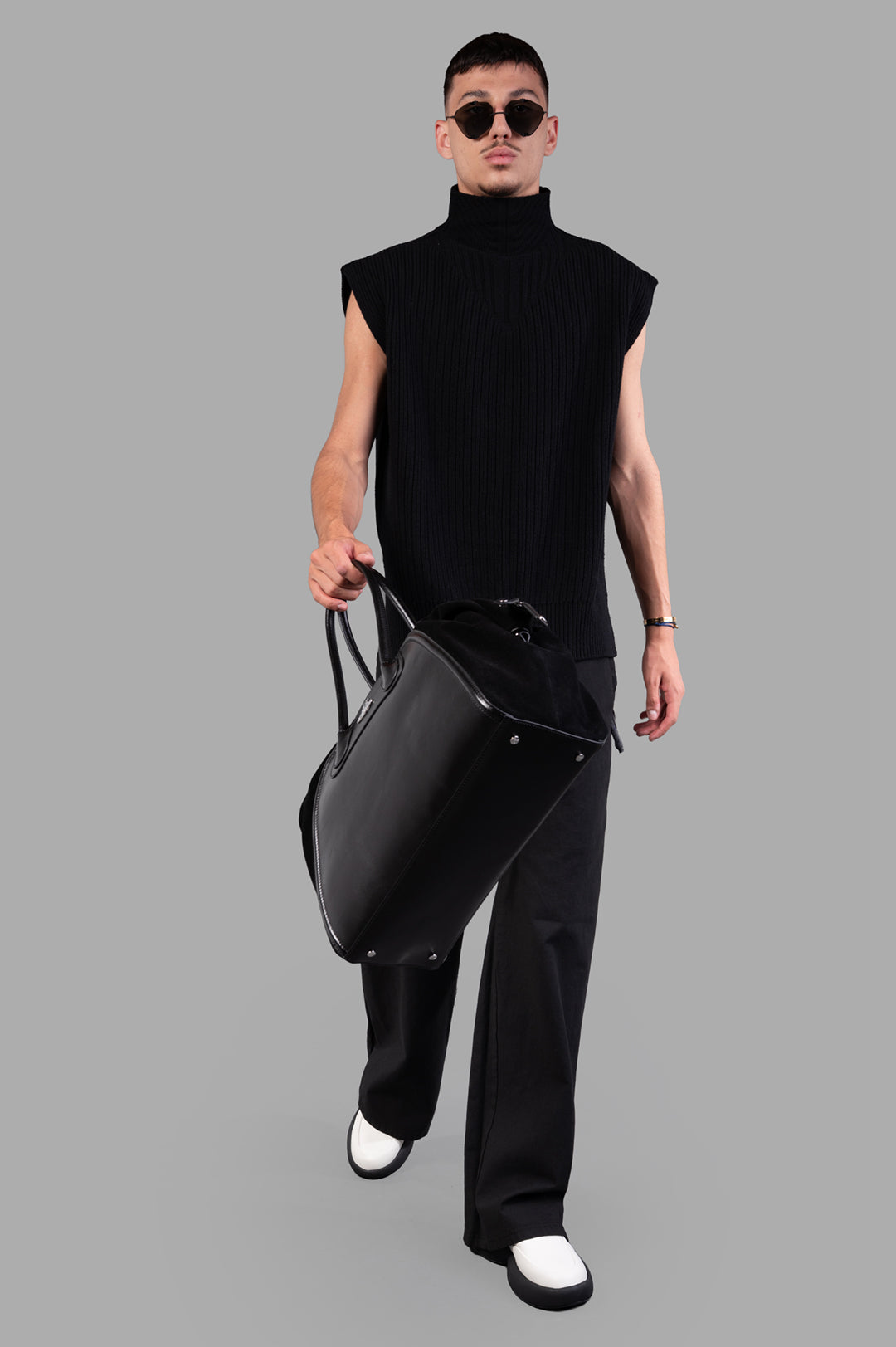 Rick Owens Concordians SL Fisherman Turtle, front view on model, showcasing ribbed texture and sleeveless design, in black.