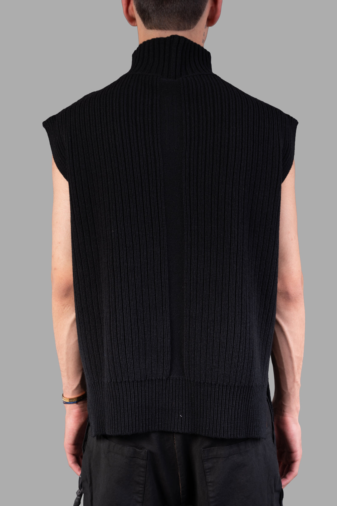 Rick Owens Concordians SL Fisherman Turtle, back view showcasing ribbed texture and turtle neck design in black wool.