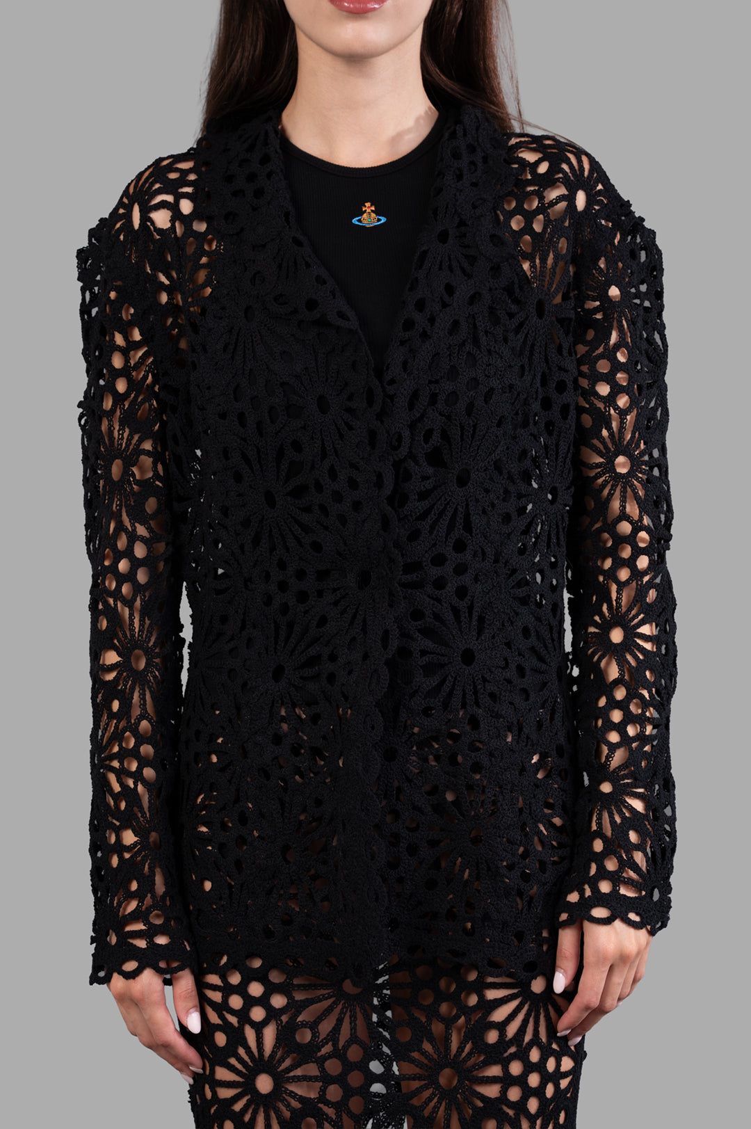 Norma Kamali Floral-motif Jacket featuring elegant black floral design, single-breasted cut, modeled for detail view.
