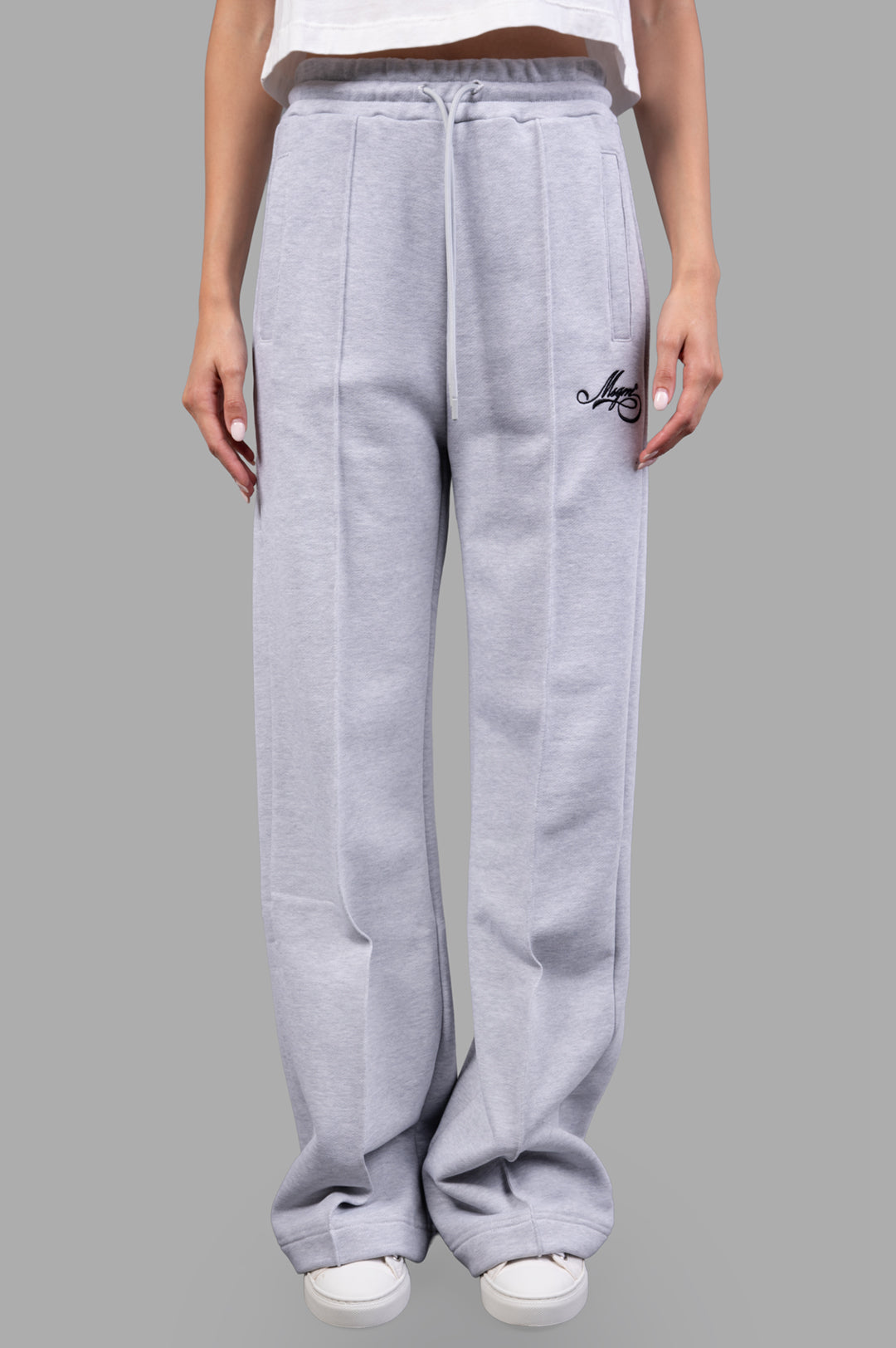 MSGM Logo Track Pants in grey, featuring elastic waistband, adjustable drawstring, and embroidered logo detail.