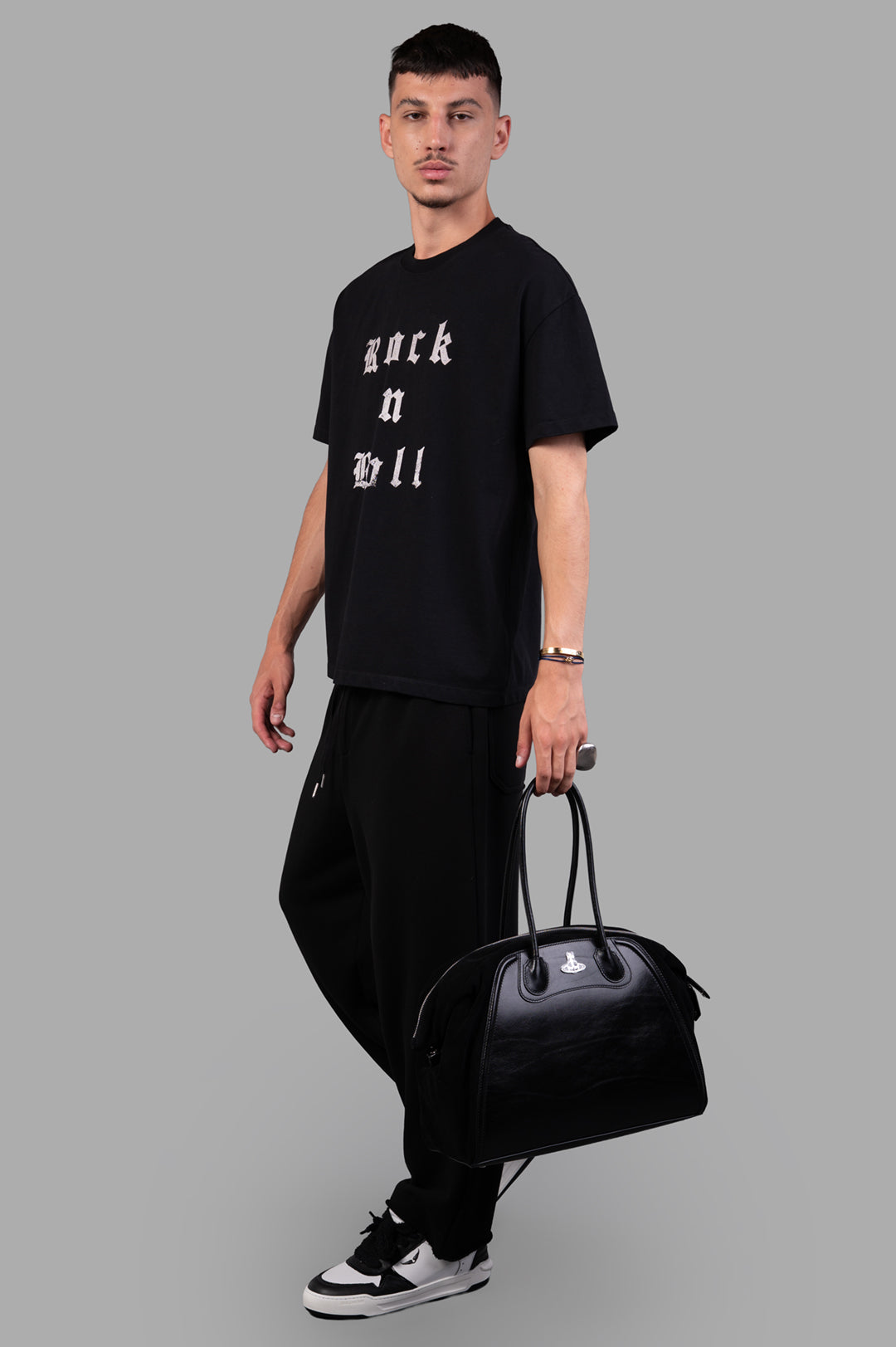 Zadig & Voltaire black Rock'n'roll T-shirt, front view on model, oversized fit, short sleeves, studded print, organic cotton.