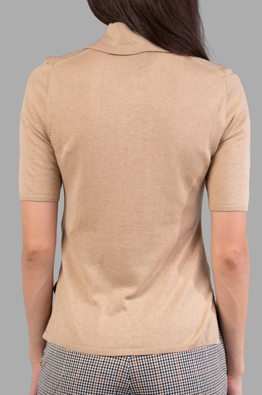 By Malene Birger Dotta Blouse in beige, showcasing the back and texture of the lightweight wool-silk blend design.