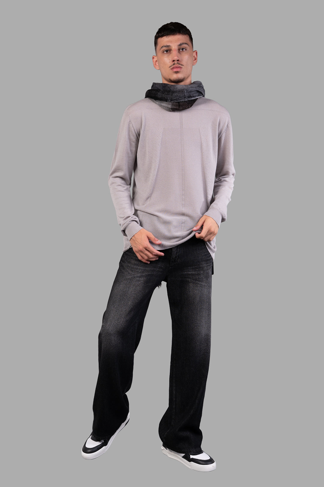 Rick Owens Crew Neck Wool Jumper in grey, on-model front view, featuring ribbed cuffs and hem for a refined look.