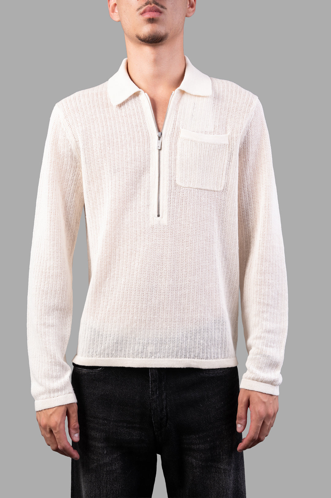 Helmut Lang Long-sleeve Zip Polo in white, relaxed fit with textured knit detail, showcased on model. Made of 100% linen.