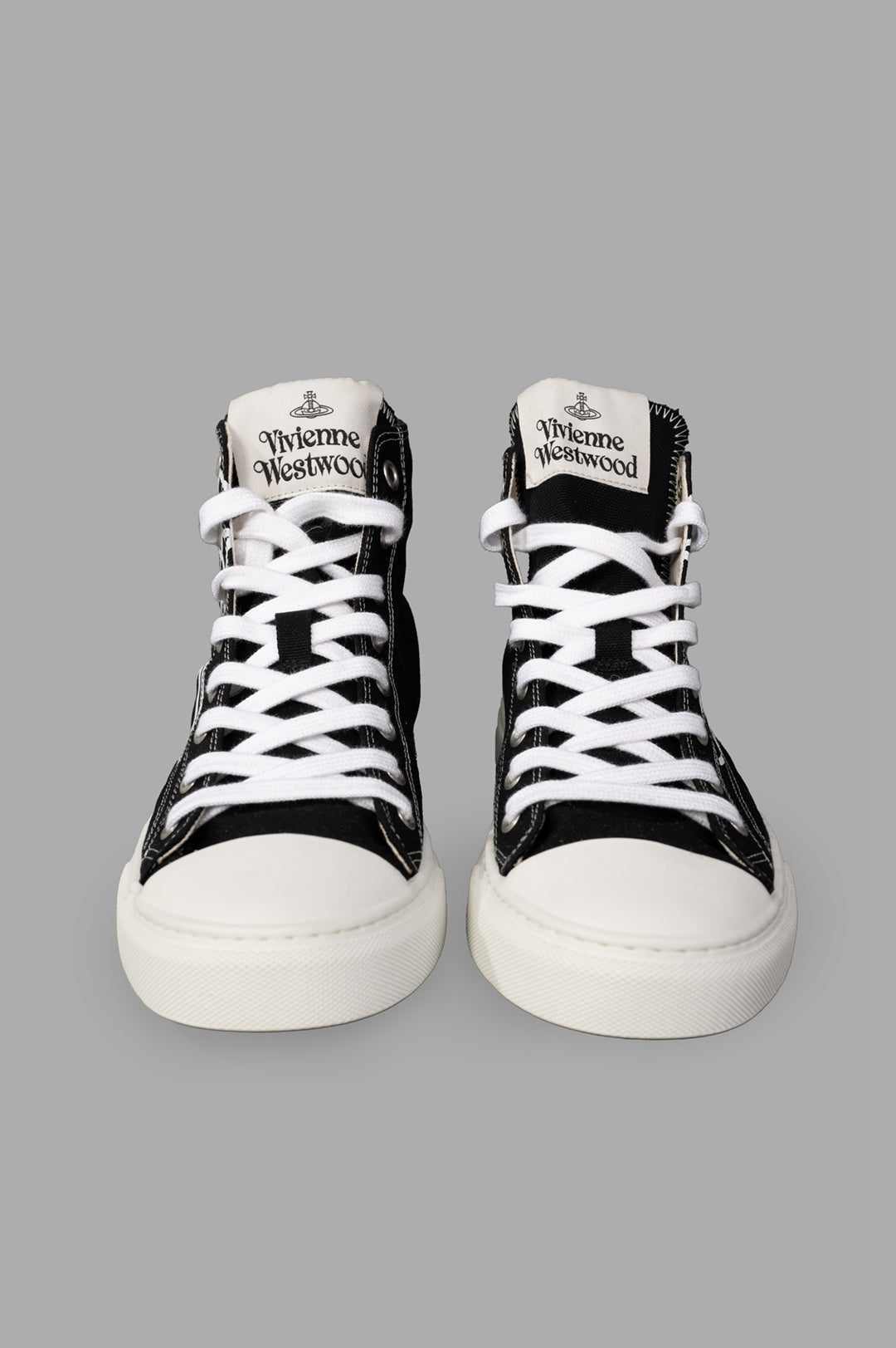 Vivienne Westwood Plimsoll High Top Canvas Sneakers featuring a black textile upper, white laces, and rubber sole, as shown.