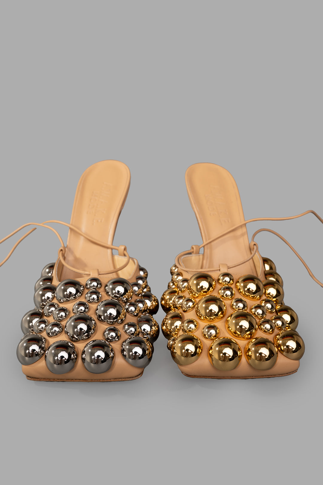 A.W.A.K.E. MODE Evening Embellished Shoes with silver and gold spherical details, showcasing a stylish square-toe design.