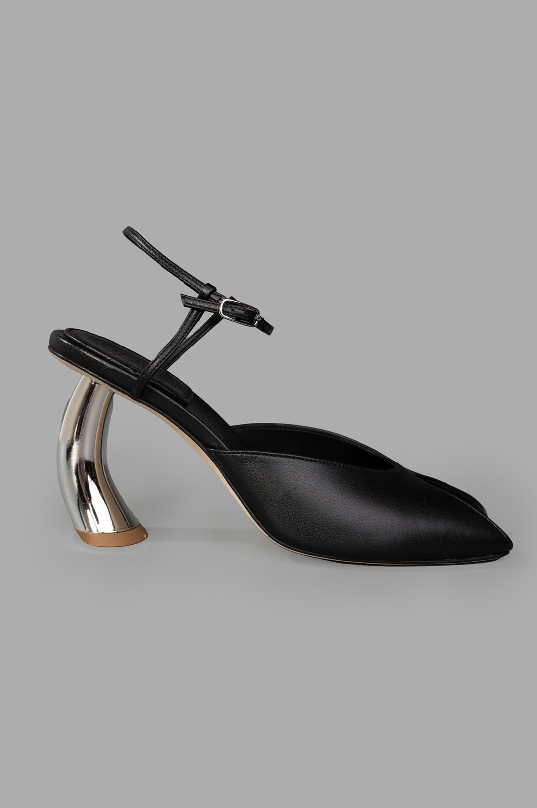 A.W.A.K.E. MODE Giustine Leather Sandals side view, black Nappa leather, gold and silver-toned heel, sleek design.