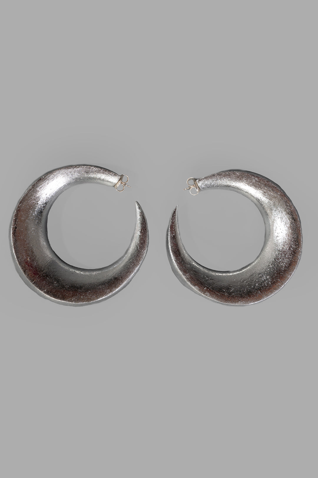 Monies Full Moon Stud Earrings front view featuring acacia wood and silver foil, showcasing elegant crescent design.