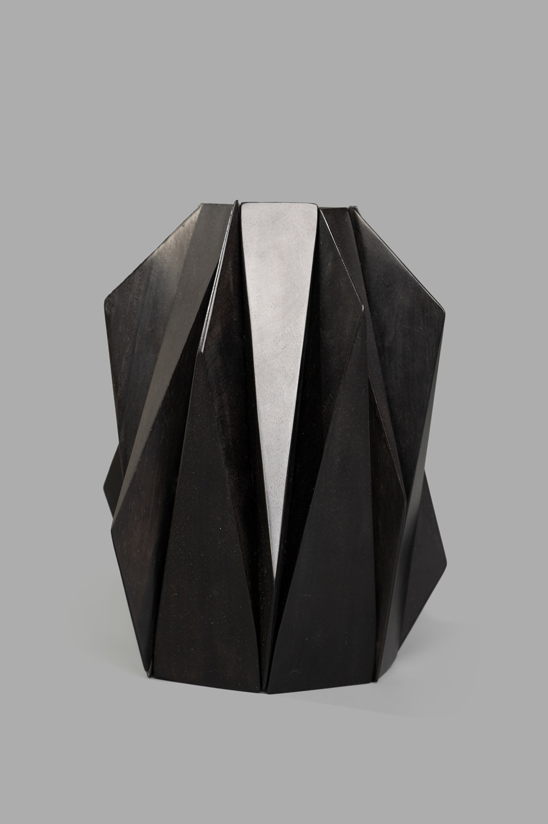 Monies Oversized Angular Bracelet in brown ebony, showcasing its striking geometric design and architectural interest.