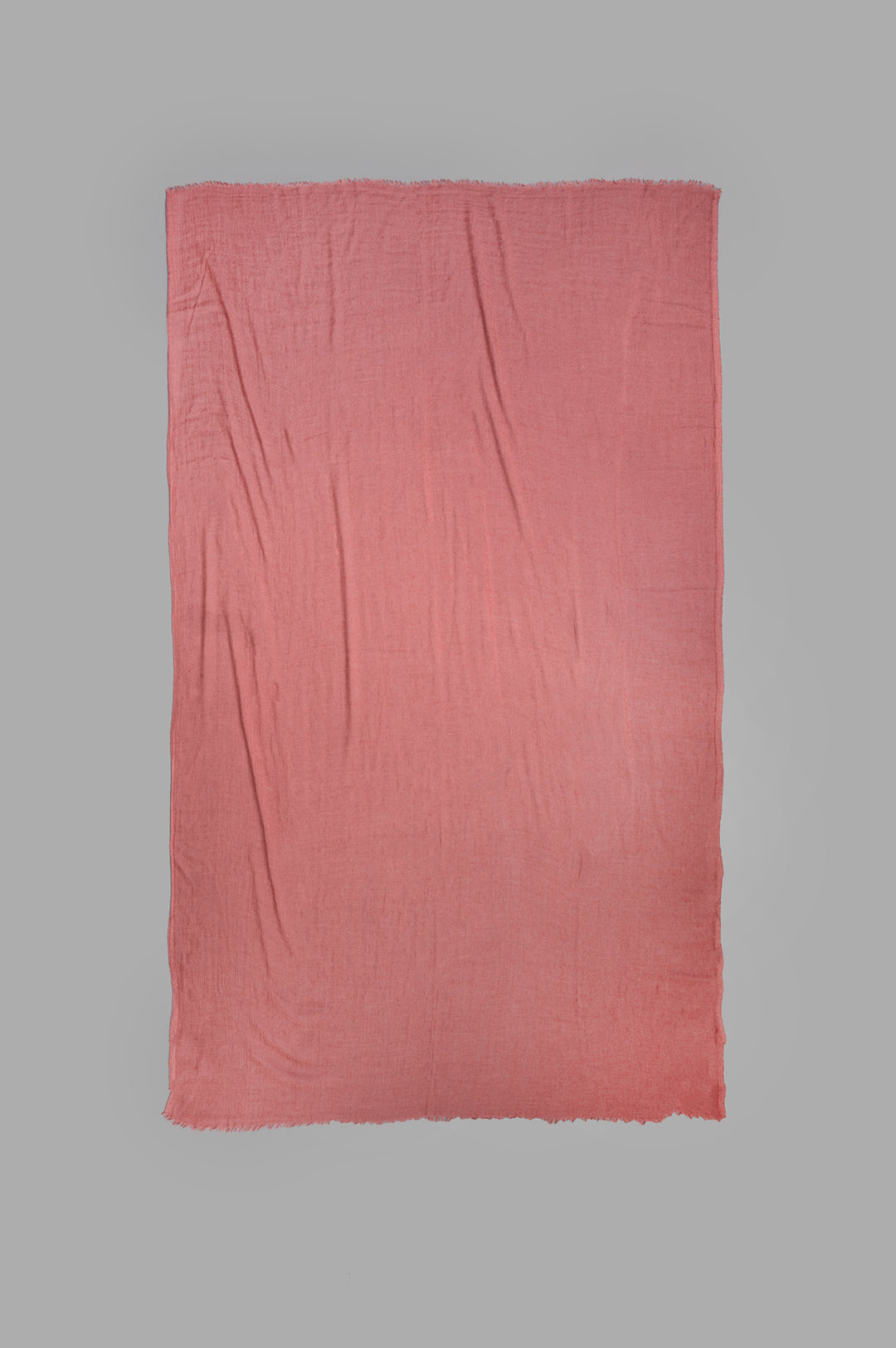 Rick Owens Concordians Follo Scarf in Rosewood, showcasing a luxurious blend of cashmere and silk, folded elegantly.