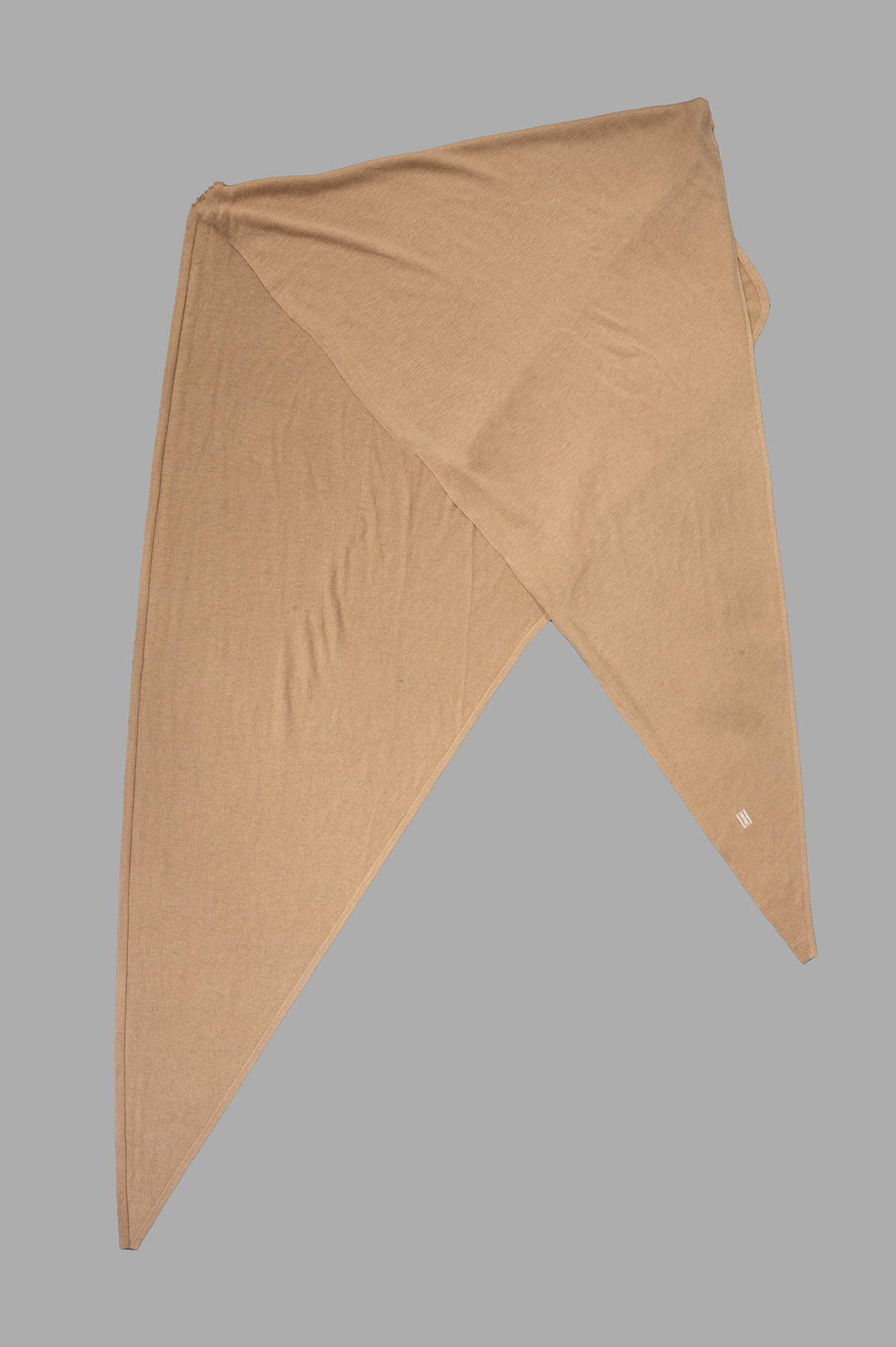 By Malene Birger Dorothea Scarf in beige, showcasing a triangle silhouette with an embroidered monogram detail.